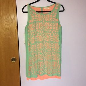 Bright colored sleeveless dress with cutouts